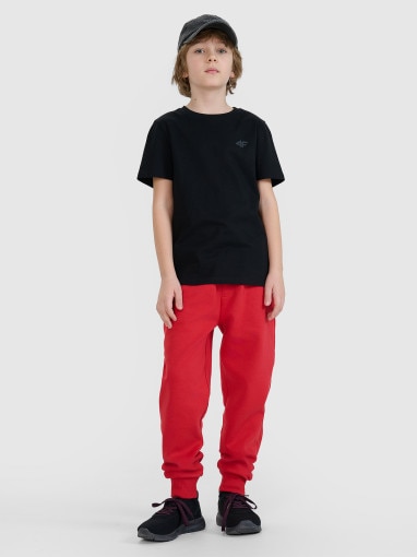 4F JUNIOR Chłopięce spodnie dresowe joggery 4F 4FJWSS25TTROM1112  czerwone Czerwony