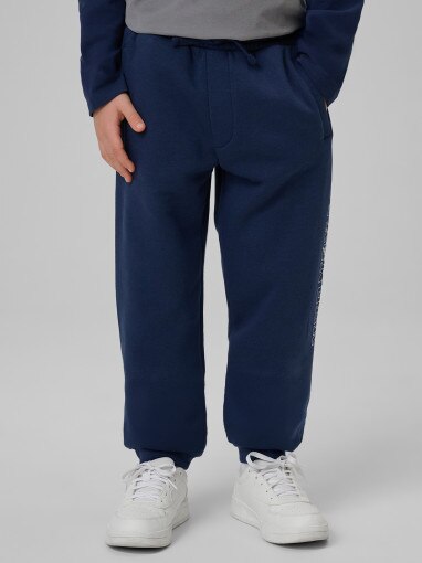 Chłopięce spodnie dresowe 4F 4FJRSS26TTROM1733 - granatowe
