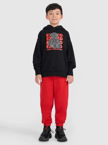 4F JUNIOR Chłopięce spodnie dresowe joggery 4F 4FJRAW25TTROM1634  czerwone Czerwony