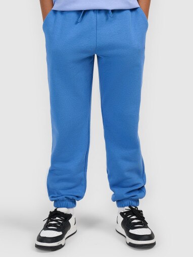 Chłopięce spodnie dresowe joggery 4F 4FJWSS26TTROM1506 - niebieskie