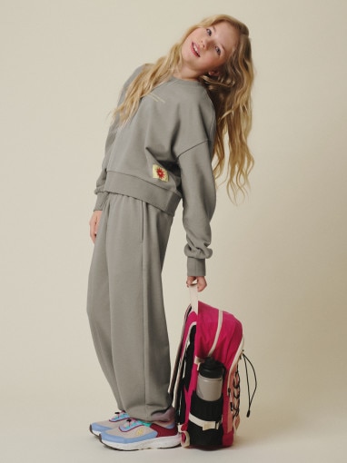  4F JUNIOR Dziewczęce spodnie dresowe 4F 4FJRSS26TTROF1871  beżowe Beżowy