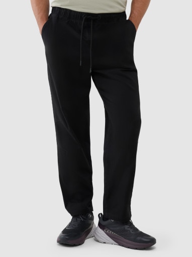 Męskie spodnie casual 4F 4FWSS25TTROM0999 - czarne