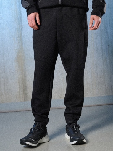 Męskie spodnie dresowe joggery 4F 4FRSS26TTROM1863 - czarne