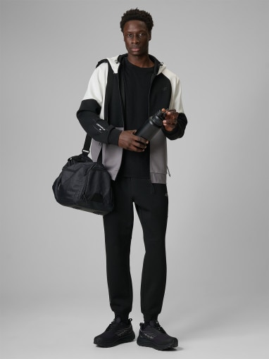  4F Męskie spodnie dresowe joggery 4F 4FRSS26TTROM1903  czarne Czarny