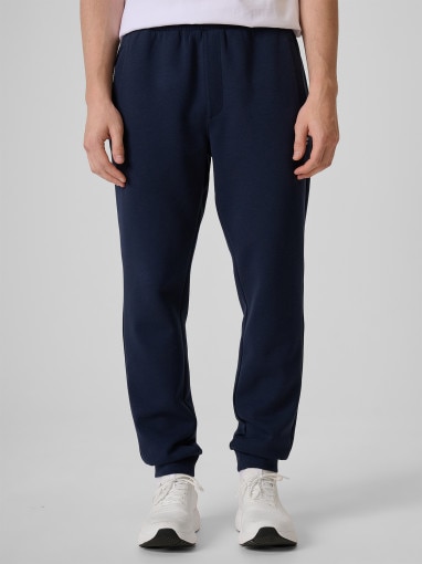 Męskie spodnie dresowe joggery 4F 4FRSS26TTROM1917 - granatowe