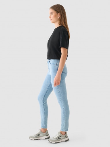 Damskie jeansy skinny Outhorn OTHWAW24TJNSF002 - niebieskie