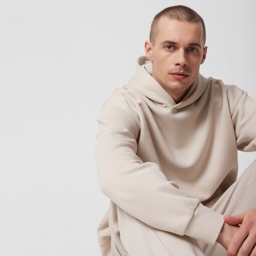 Męska bluza dresowa oversize nierozpinana z kapturem Outhorn OTHWSS24TSWSM1163 - kremowa
