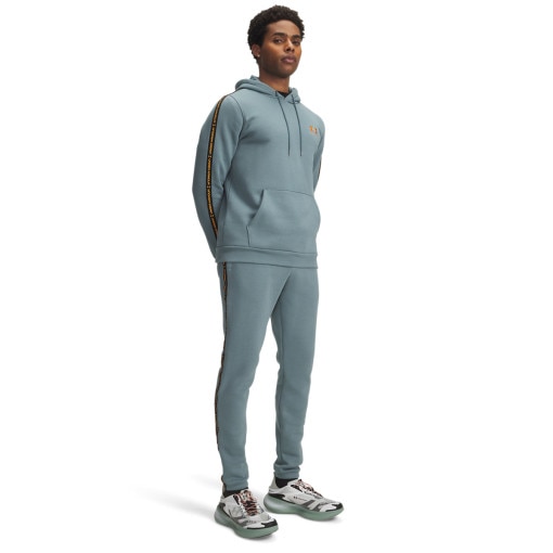 UNDER ARMOUR Męskie spodnie dresowe Under Armour UA Icon Fleece Jogger Taping  niebieskie Niebieski