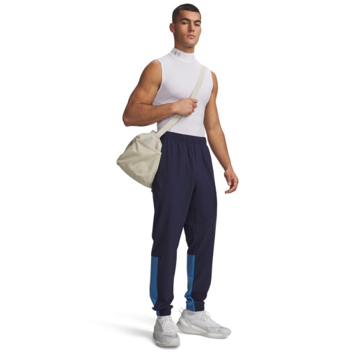 Obrazek dla: UNDER ARMOUR Męskie spodnie treningowe Under Armour UA Tech Utility Woven Pant   granatowe Granatowy