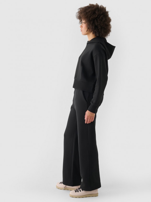 Damskie spodnie dresowe Outhorn OTHWAW24TTROF1076 - czarne