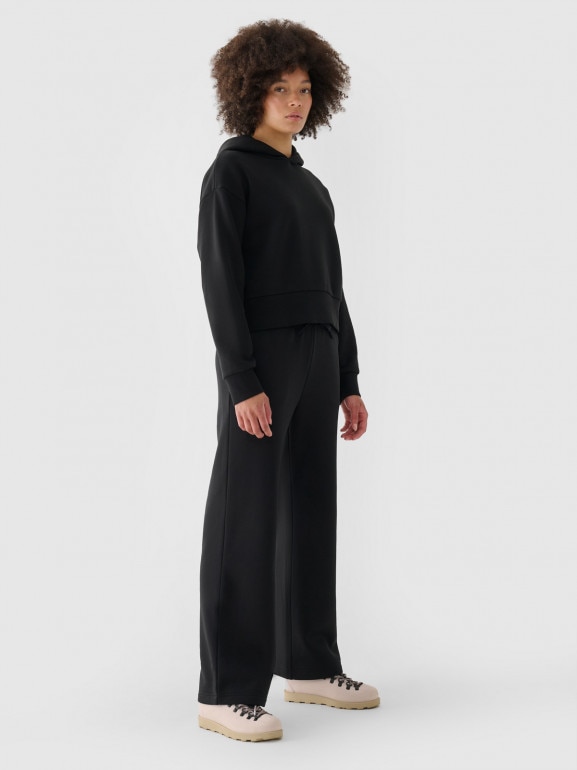 Damskie spodnie dresowe Outhorn OTHWAW24TTROF1076 - czarne