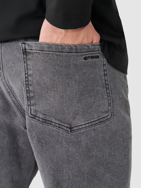 Męskie jeansy slim Outhorn OTHWAW24TJNSM011 - szare