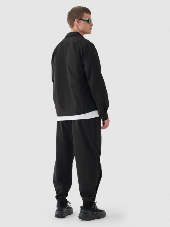 Męskie spodnie casual tkaninowe Outhorn OTHWAW24TTROM0894 - czarne