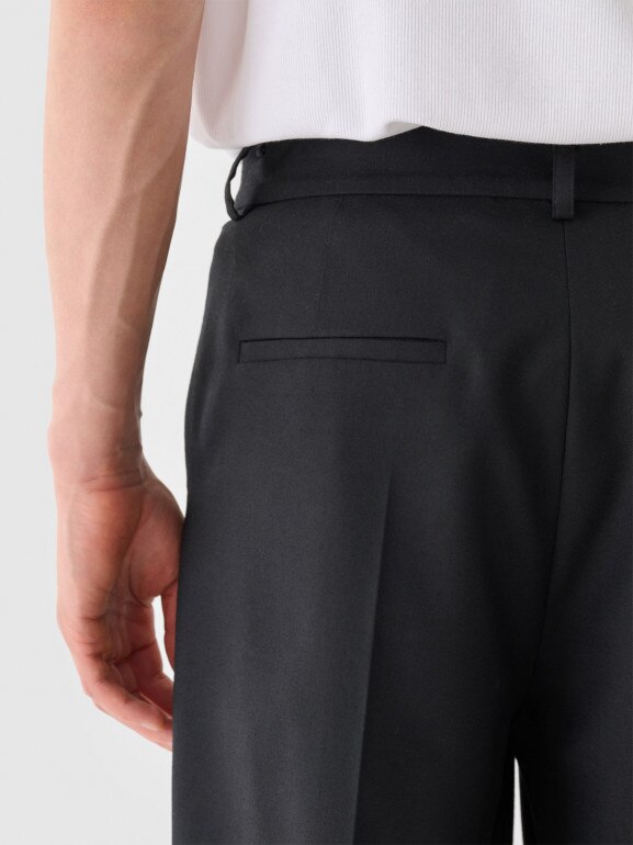 Męskie spodnie casual tkaninowe Outhorn OTHWAW24TTROM0896 - czarne