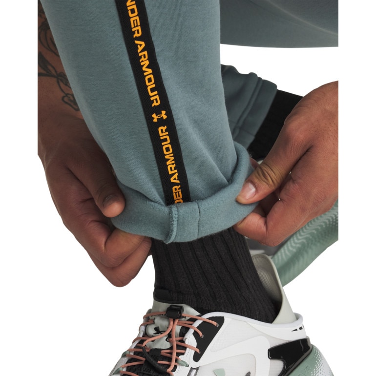 Męskie spodnie dresowe Under Armour UA Icon Fleece Jogger Taping - niebieskie