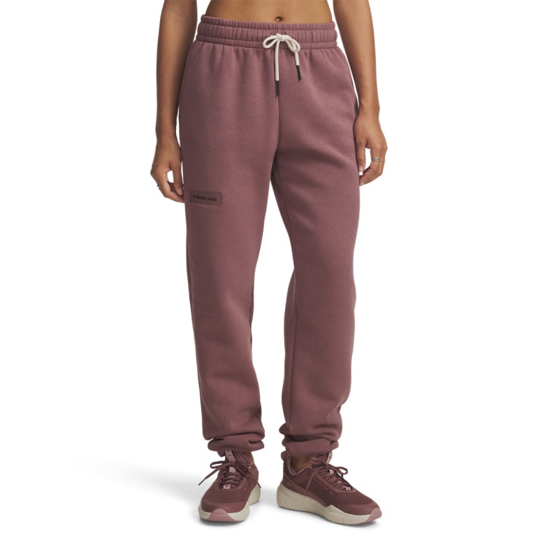 Damskie spodnie dresowe joggery Under Armour Project Rock Icon Pant - różowe