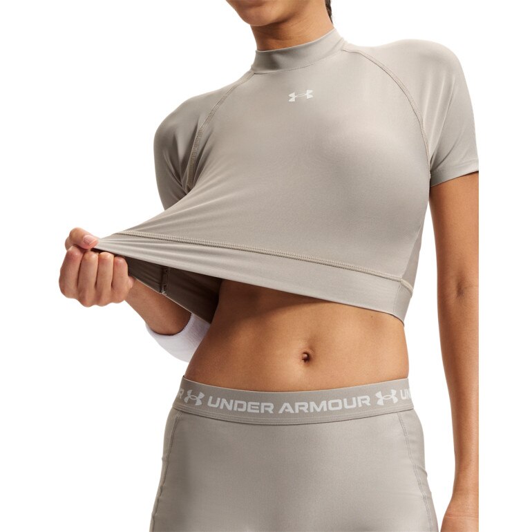 Damska koszulka treningowa Under Armour HeatGear Crop Mock SS - beżowa