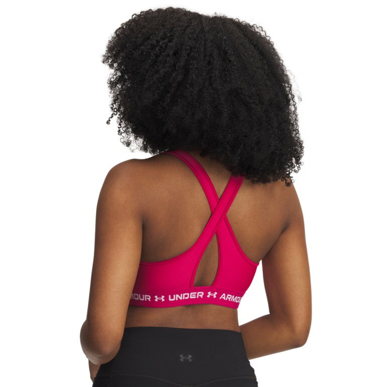 Biustonosz treningowy Under Armour Crossback Mid Bra - różowy