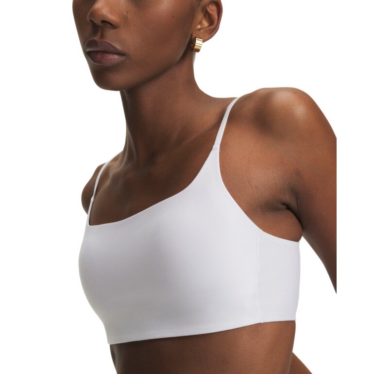 Damski biustonosz treningowy Under Armour Open Back Bralette - biały