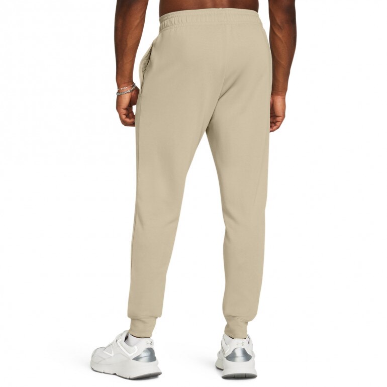 Męskie spodnie dresowe Under Armour UA Rival Terry Jogger - beżowe