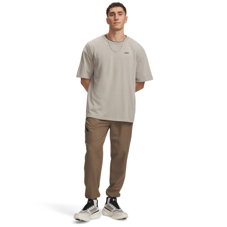 Męskie spodnie dresowe Under Armour UA Unstoppable Woven Jogger - brązowe