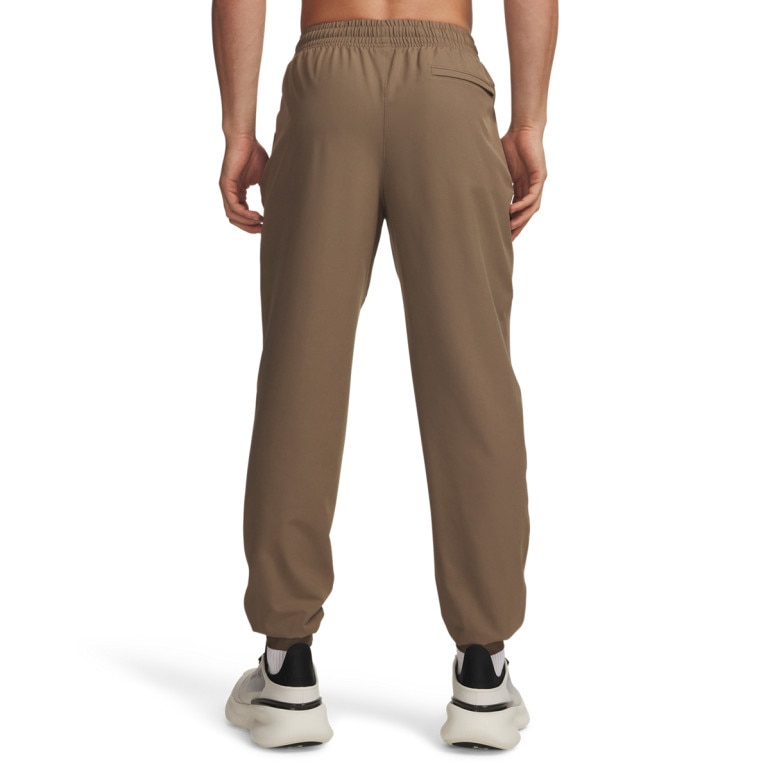 Męskie spodnie dresowe Under Armour UA Unstoppable Woven Jogger - brązowe
