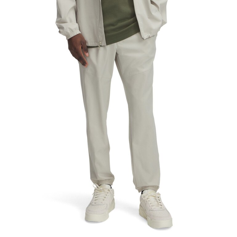 Męskie spodnie treningowe Under Armour UA Vibe Woven Pants -beżowe